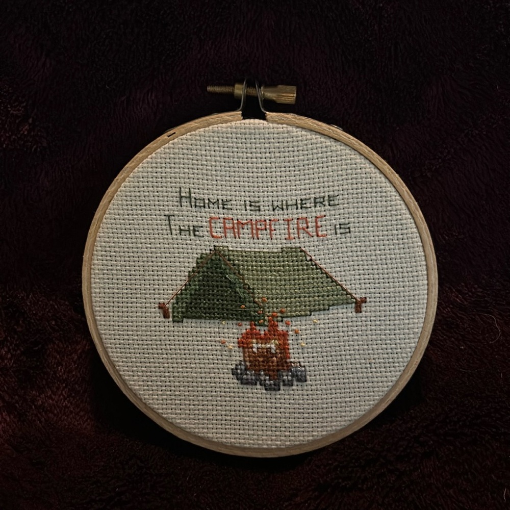 Handmade cross stitch. Camping